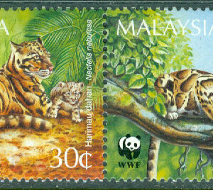 Malaysia – M  557-560 WWF Världsvitt naturskydd. Grumlade leoparder, 4-strip kpl **